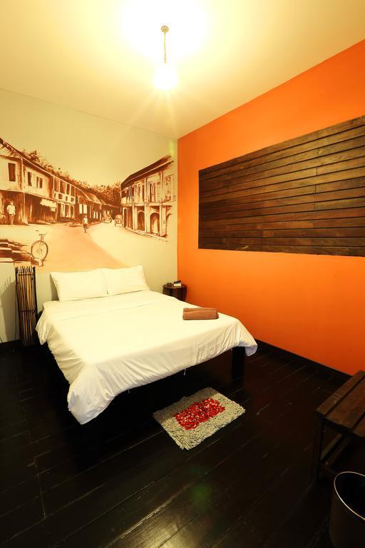 Luang Poj Boutique Hostel Ranong Quarto foto